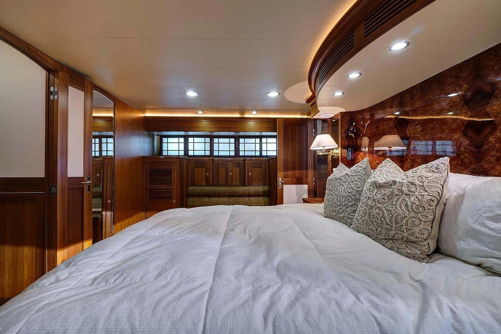 a bed with pillows aboard JOAN'S RONDEVOUS Yacht for Sale