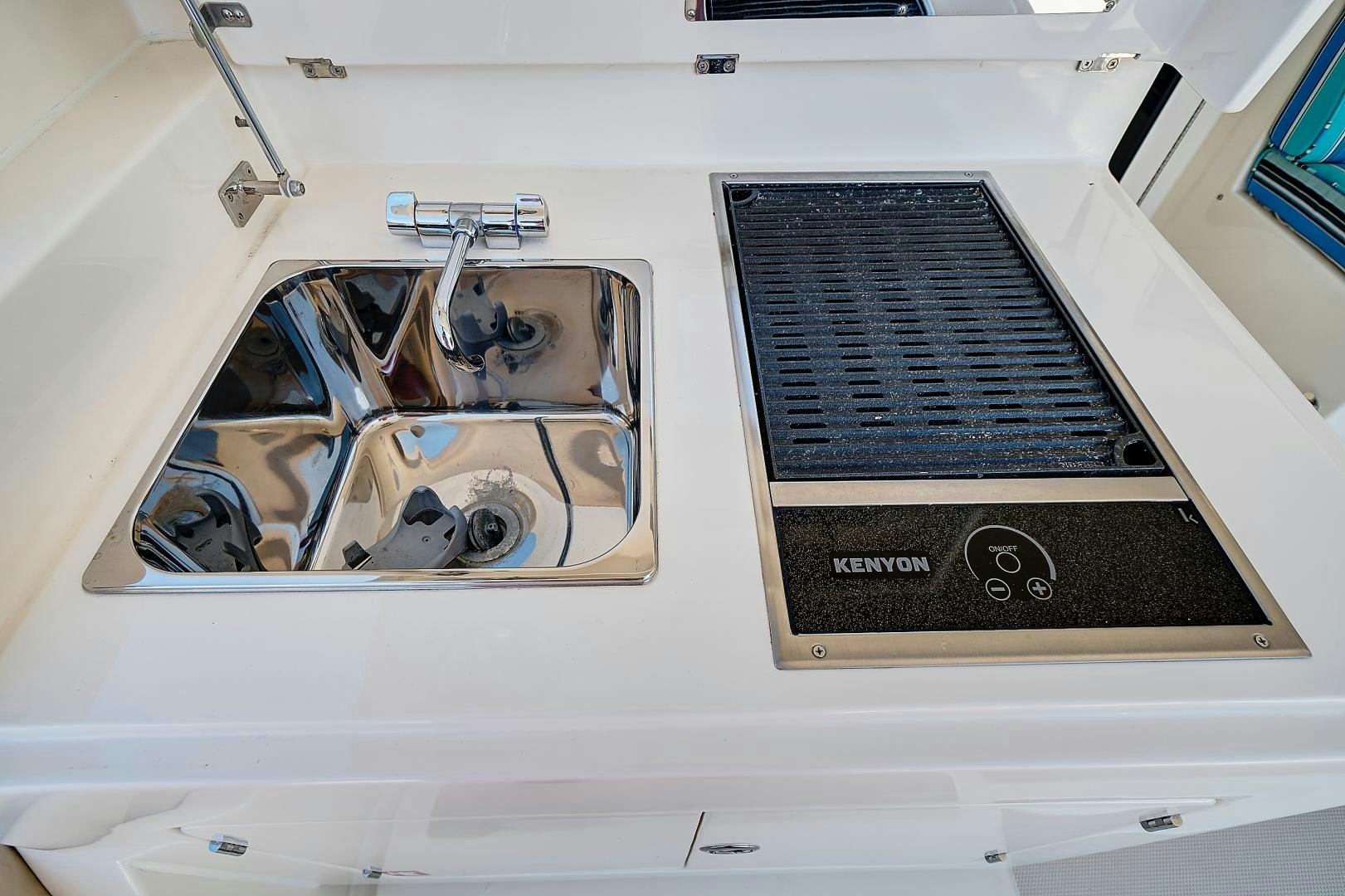 a car with a large engine aboard JOAN'S RONDEVOUS Yacht for Sale