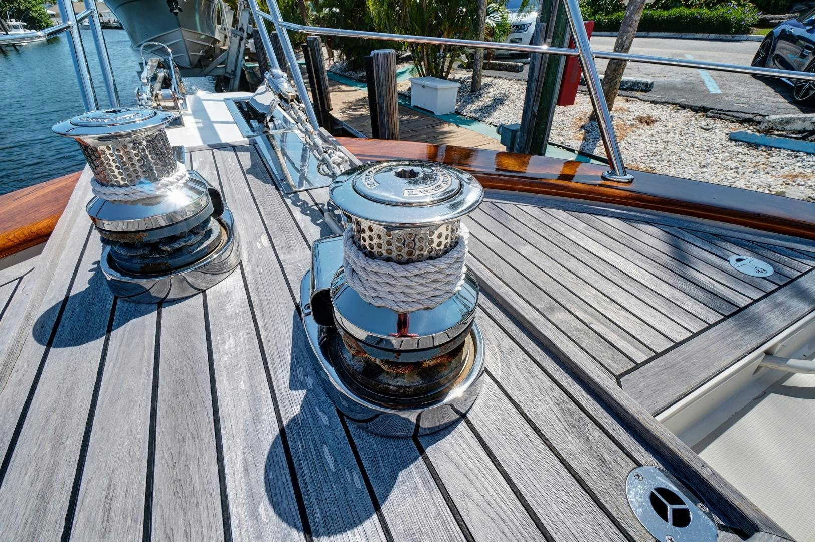 a wood deck with a metal railing and a metal railing with a railing and a railing and a aboard JOAN'S RONDEVOUS Yacht for Sale