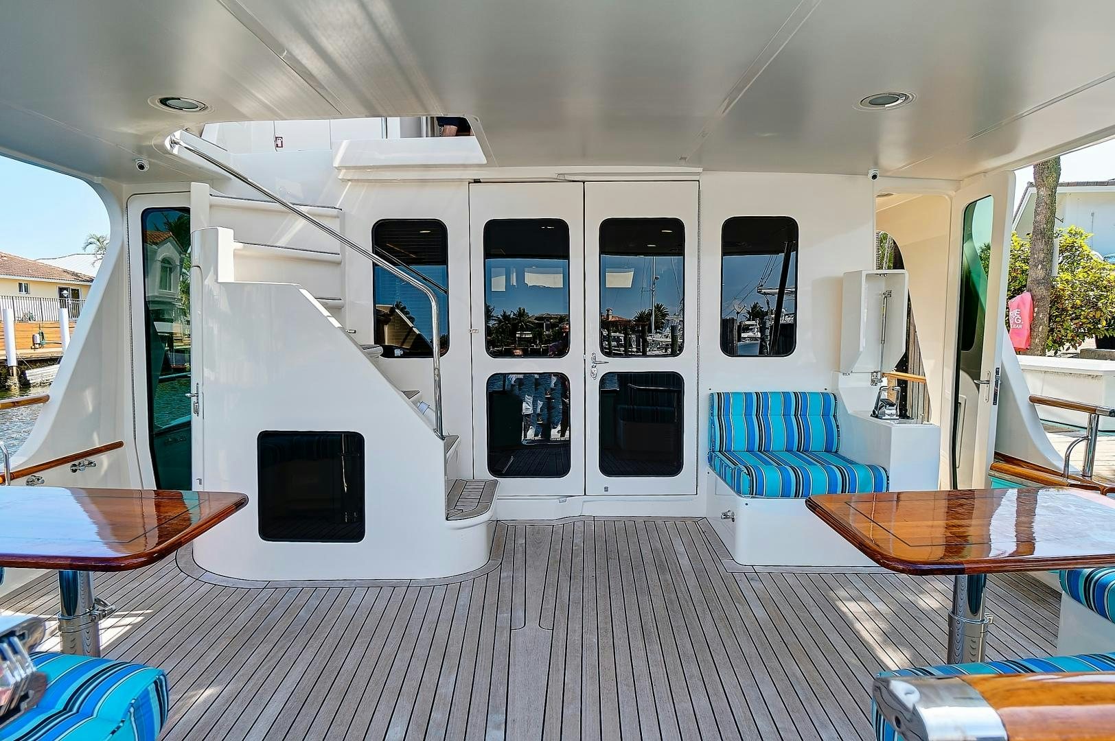 a room with a table and chairs aboard JOAN'S RONDEVOUS Yacht for Sale