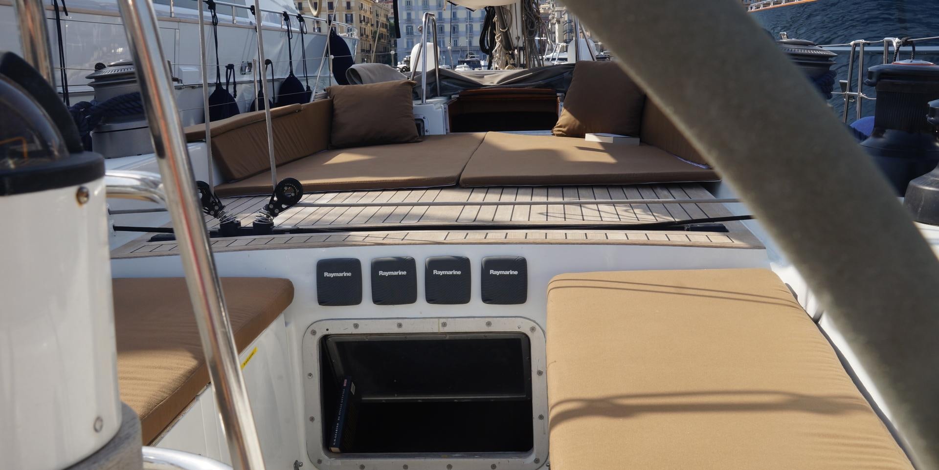 a wooden boat on a boat aboard kings legend Yacht for Sale