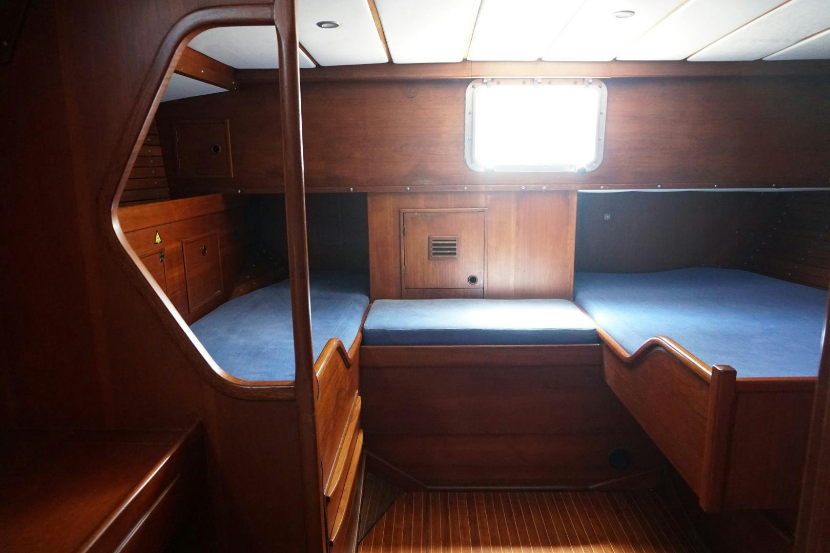 a room with bunk beds aboard kings legend Yacht for Sale