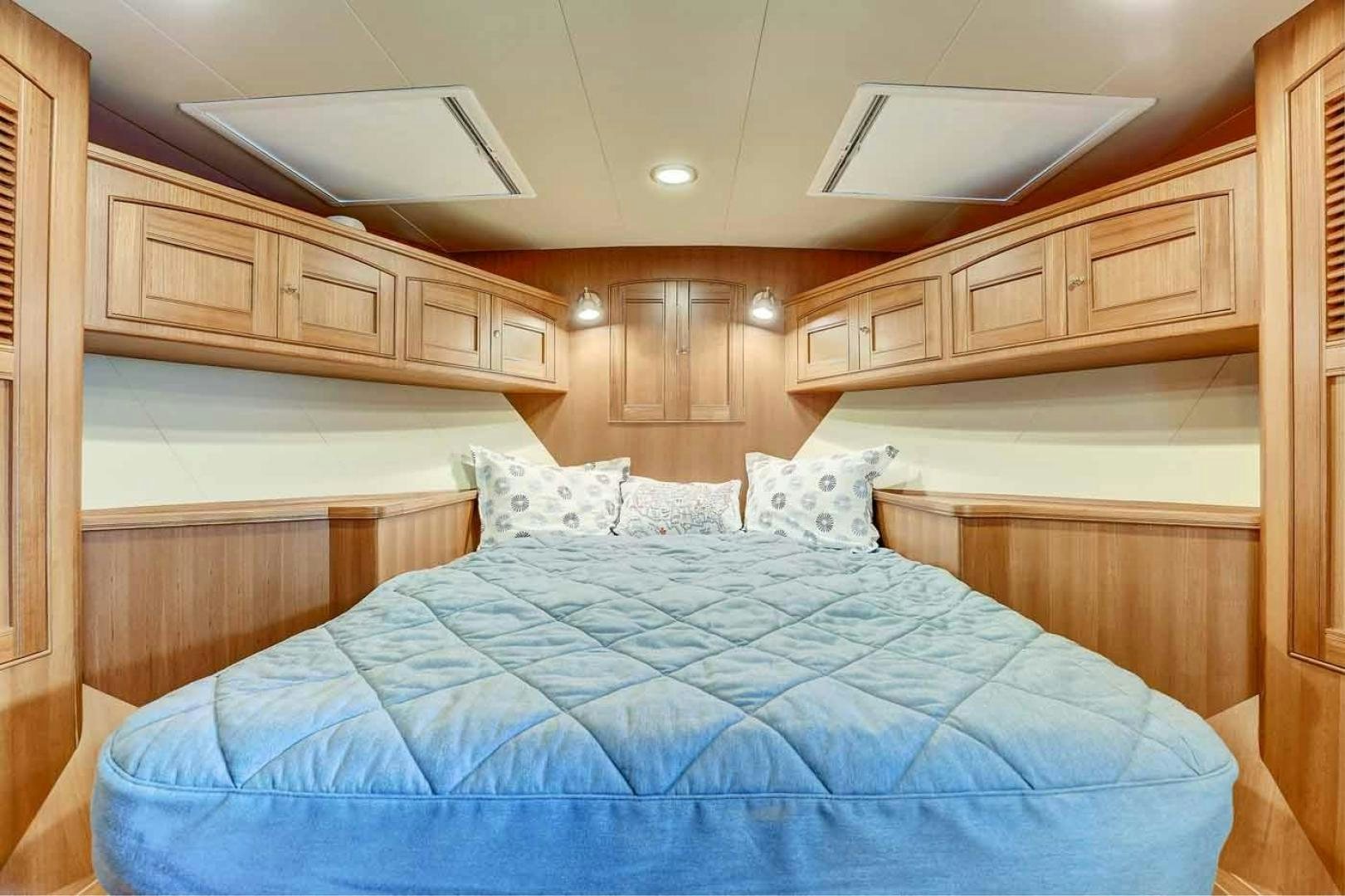 a bed in a room aboard MEGUSTA Yacht for Sale