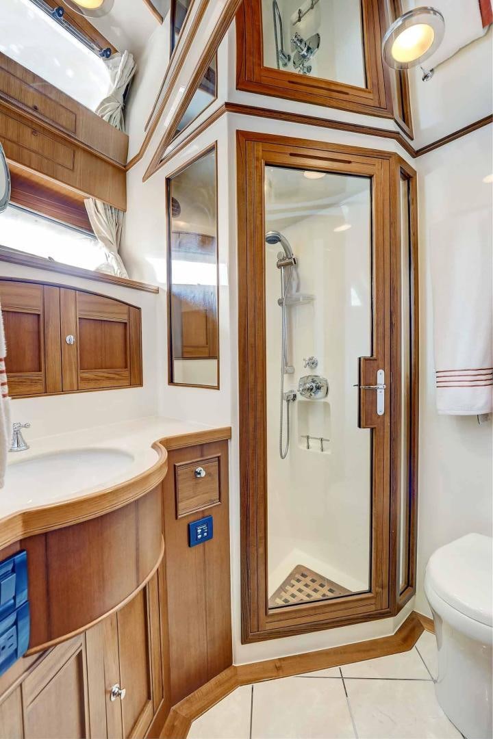 a bathroom with a glass shower aboard MEGUSTA Yacht for Sale