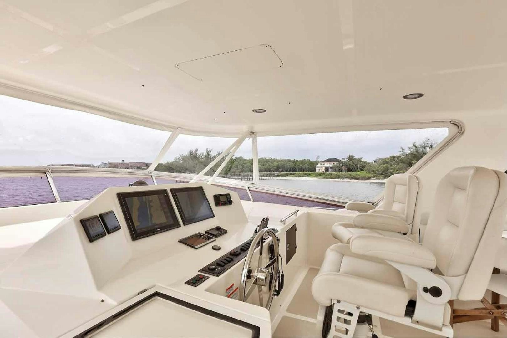 inside of a white car aboard MEGUSTA Yacht for Sale