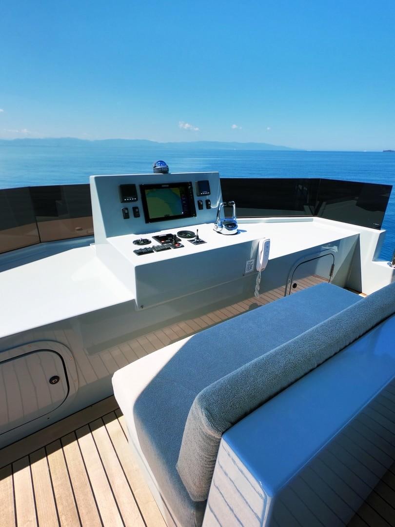 a room with a large window and a view of the ocean aboard MUZO'S 20 Yacht for Sale