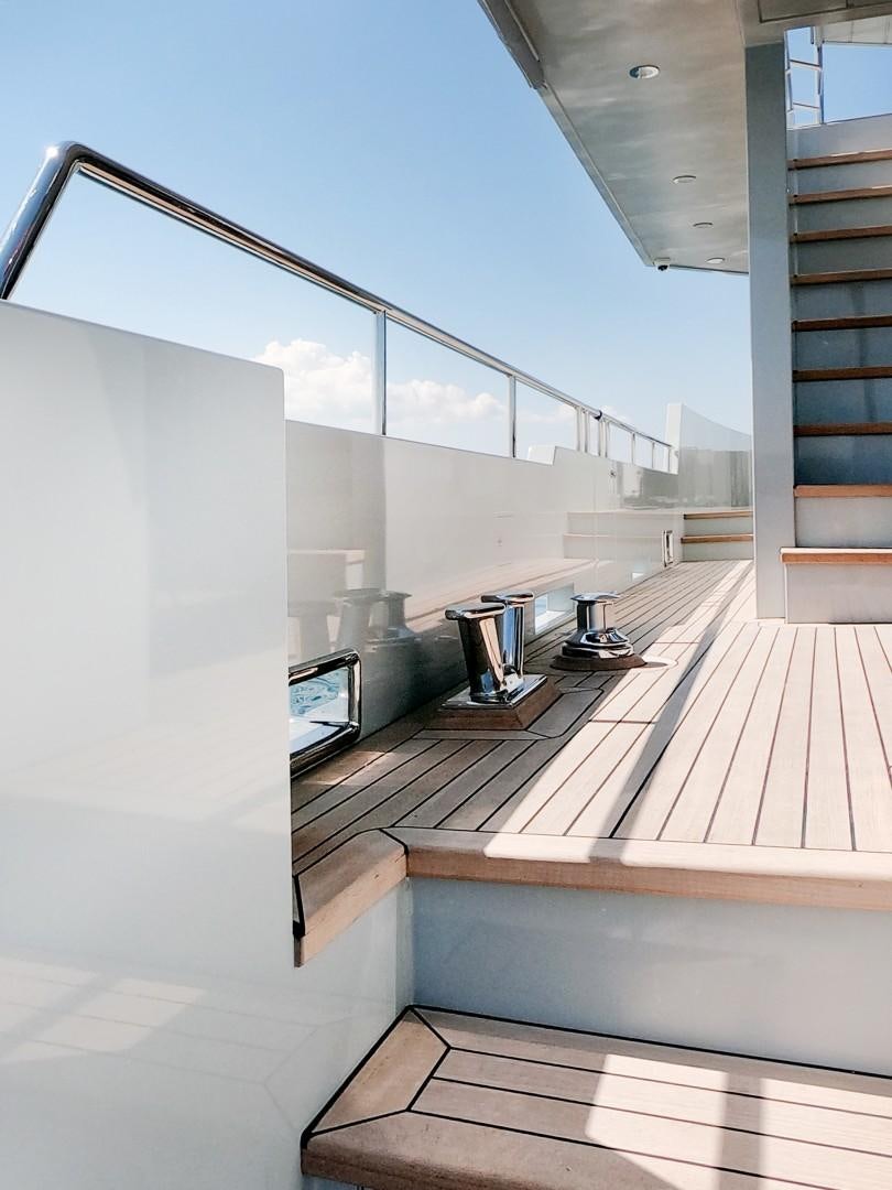 a room with a staircase and a window aboard MUZO'S 20 Yacht for Sale