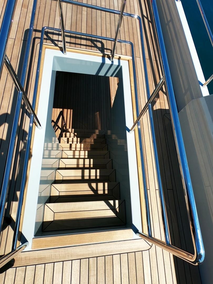 a set of stairs leading up to a building aboard MUZO'S 20 Yacht for Sale