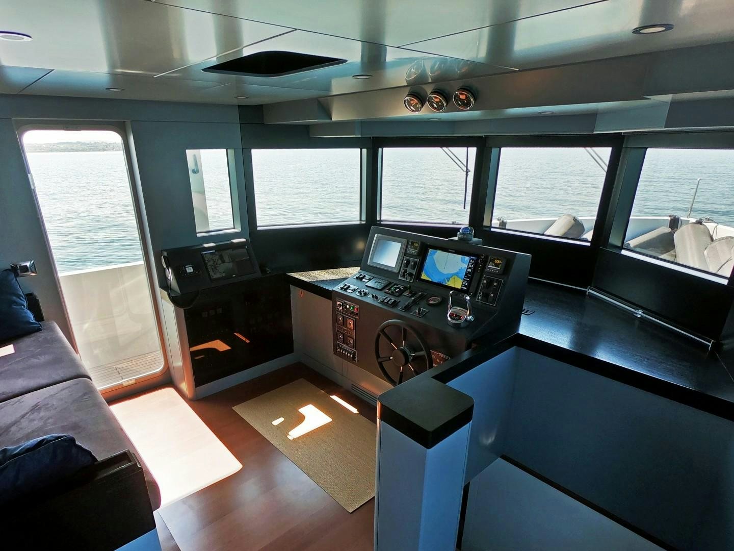 a room with a desk and a computer aboard MUZO'S 20 Yacht for Sale