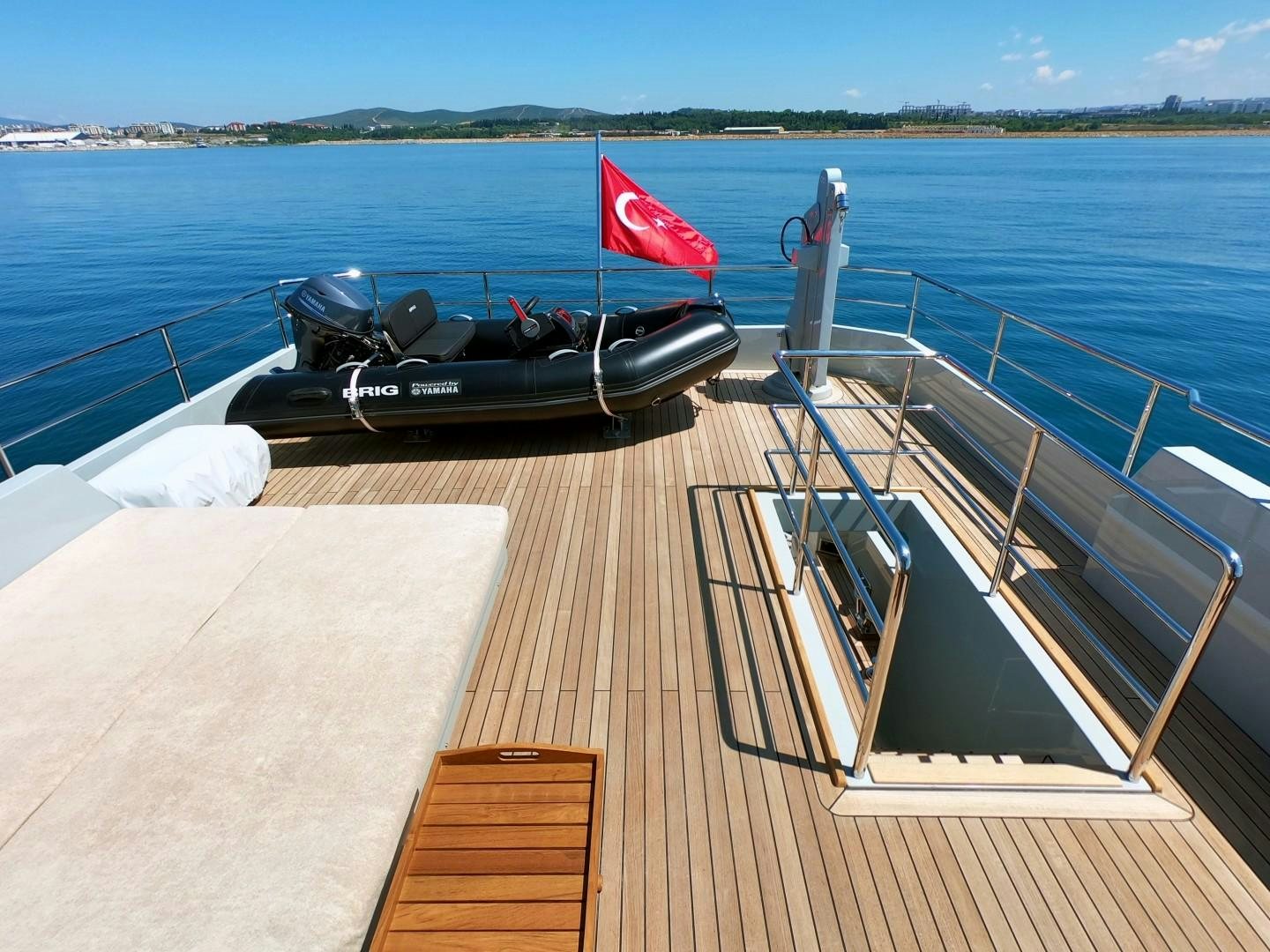 a boat on a deck aboard MUZO'S 20 Yacht for Sale