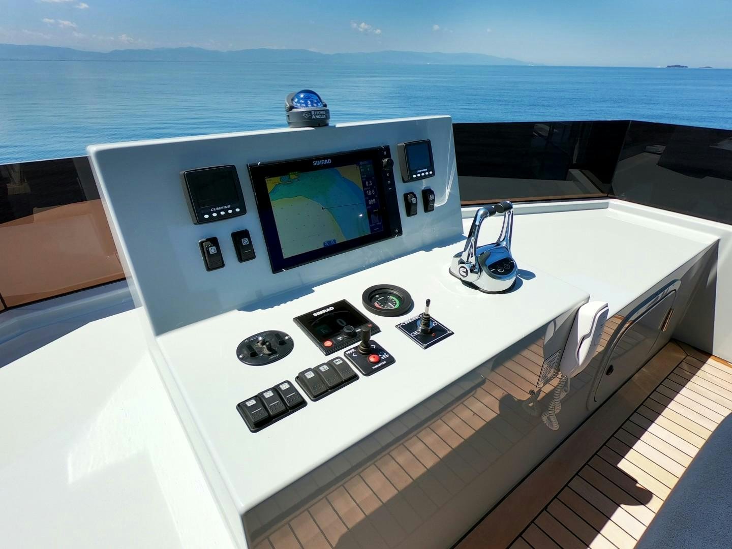 a large white machine with a screen aboard MUZO'S 20 Yacht for Sale