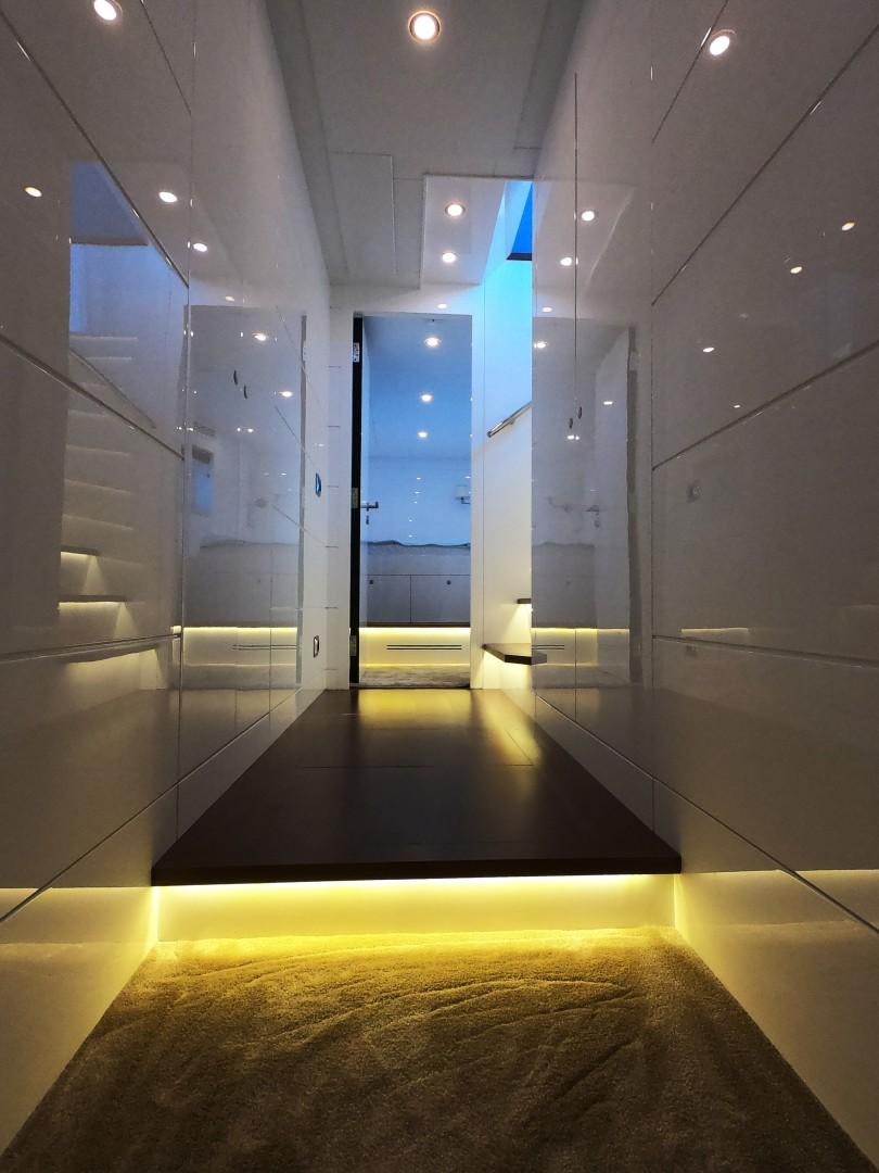 a hallway with doors aboard MUZO'S 20 Yacht for Sale