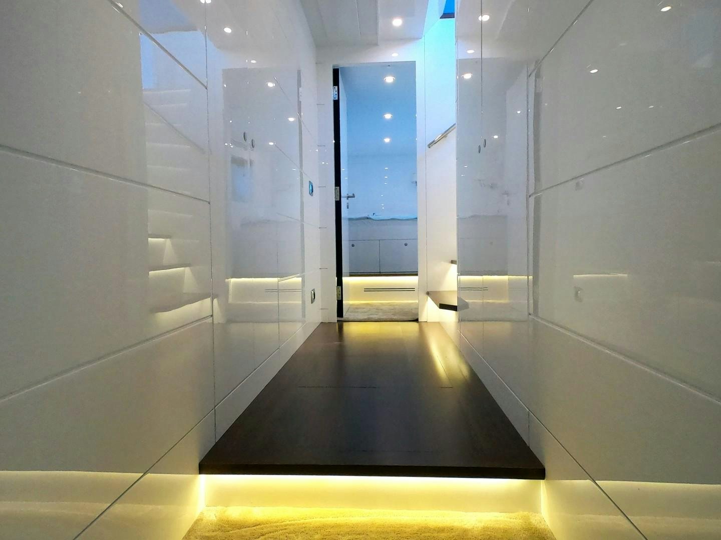 a hallway with doors aboard MUZO'S 20 Yacht for Sale
