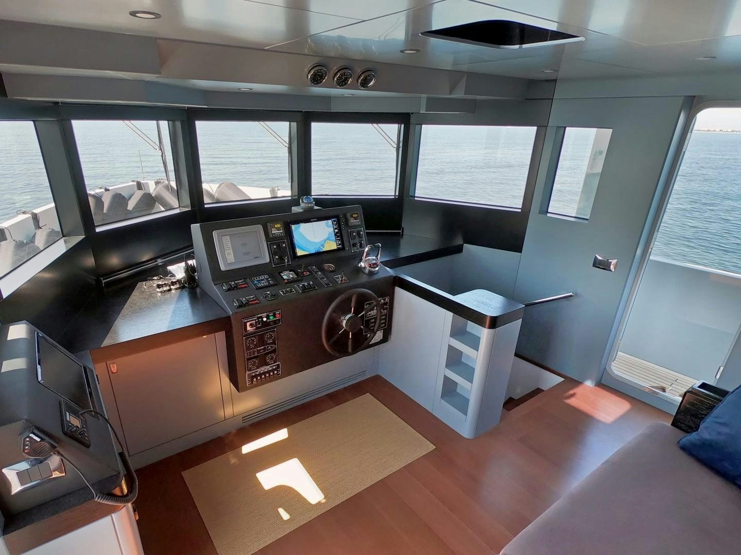 a room with a desk and a computer aboard MUZO'S 20 Yacht for Sale