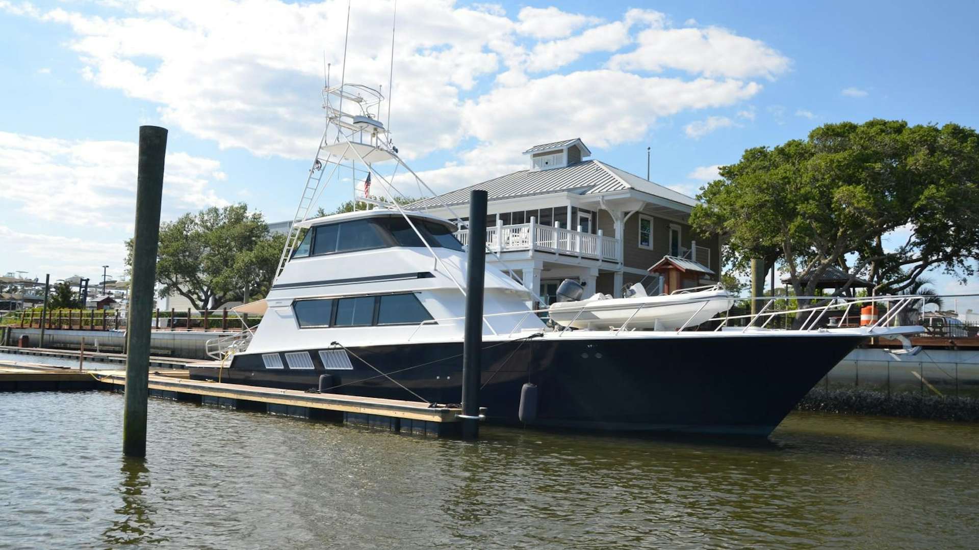 a boat docked at a pier aboard No Name Yacht for Sale