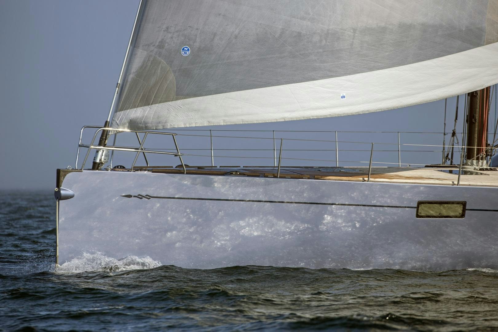 a large white boat on the water aboard prevail Yacht for Sale