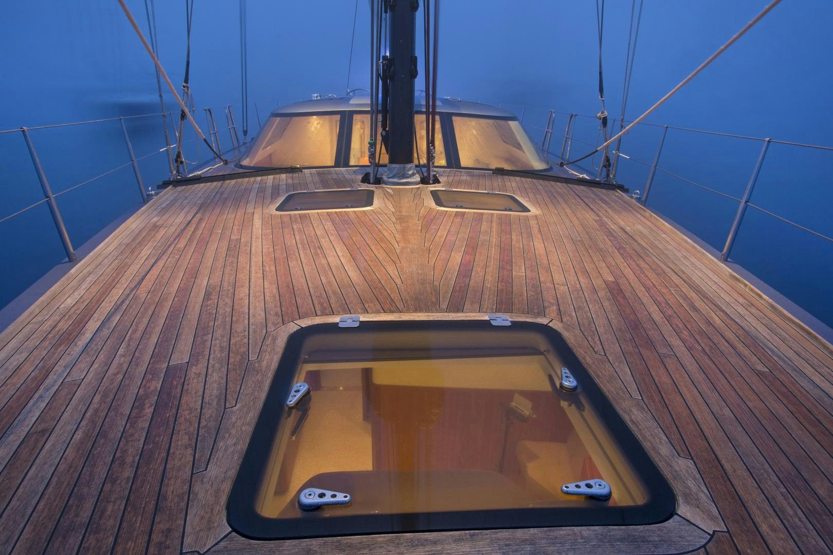 a black rectangular object on a wooden deck aboard prevail Yacht for Sale