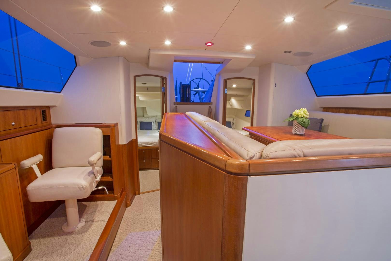 a room with a desk and a chair aboard prevail Yacht for Sale