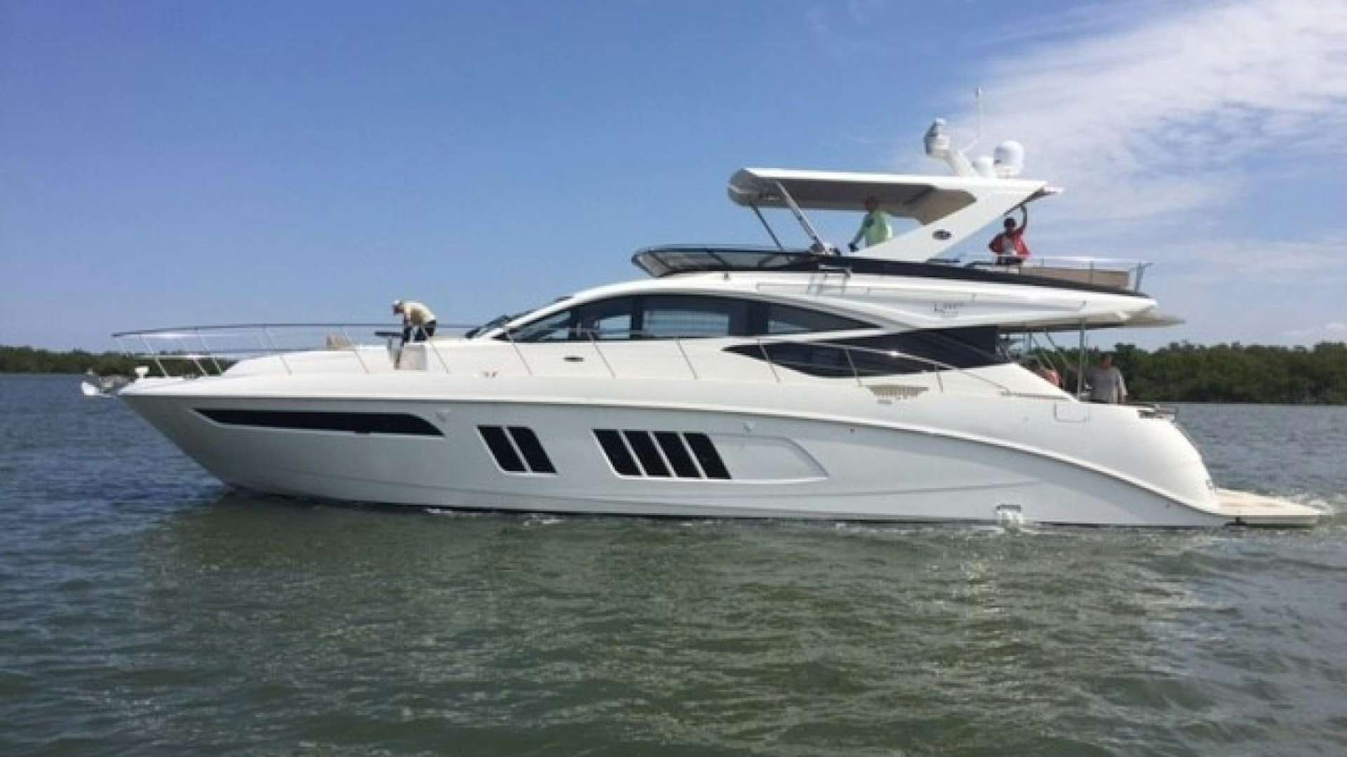 a white yacht in the water aboard SERENE Yacht for Sale