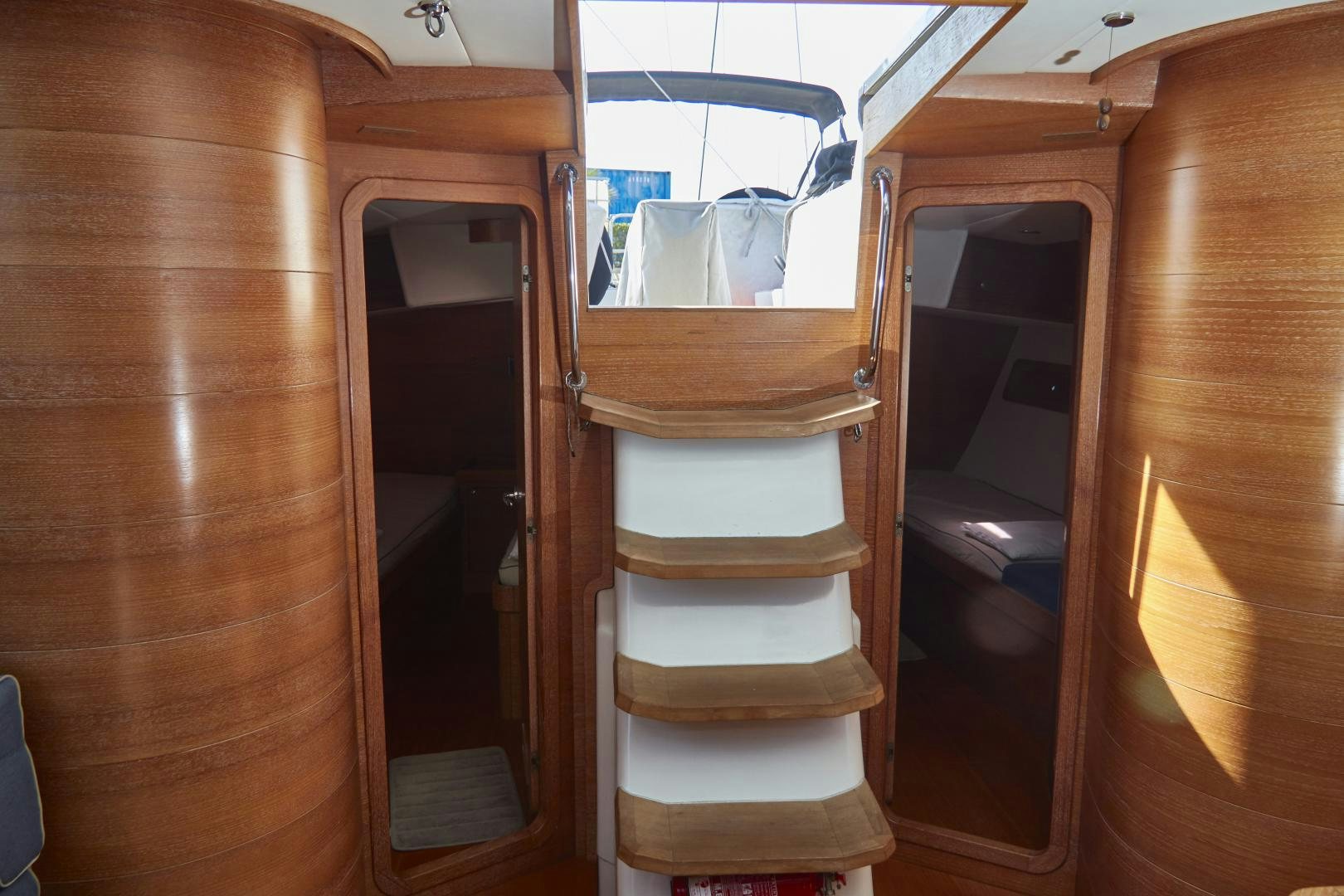 a wooden staircase leading to a room aboard SPIRIT OF ALTAIR Yacht for Sale
