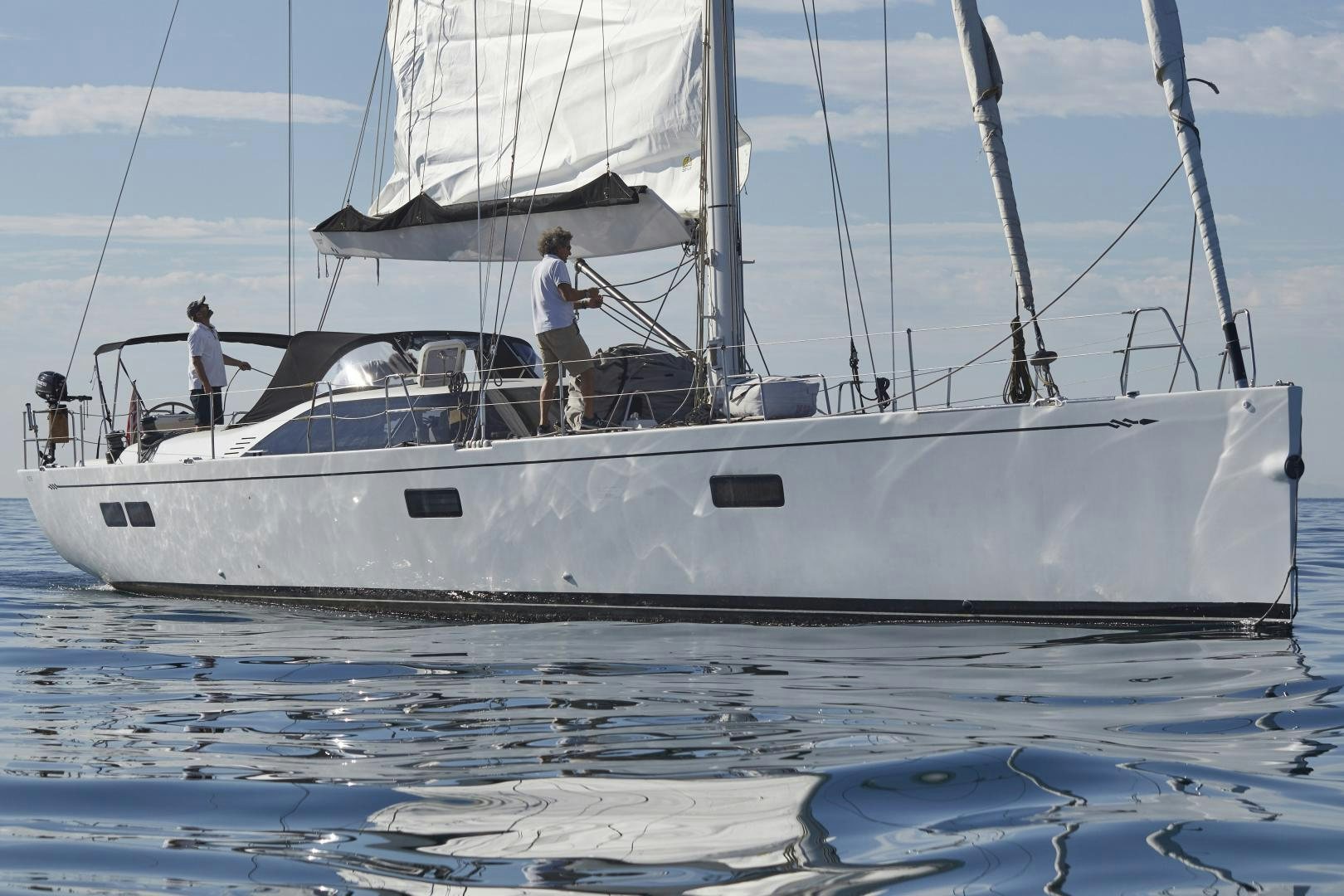 a couple of people on a boat aboard SPIRIT OF ALTAIR Yacht for Sale
