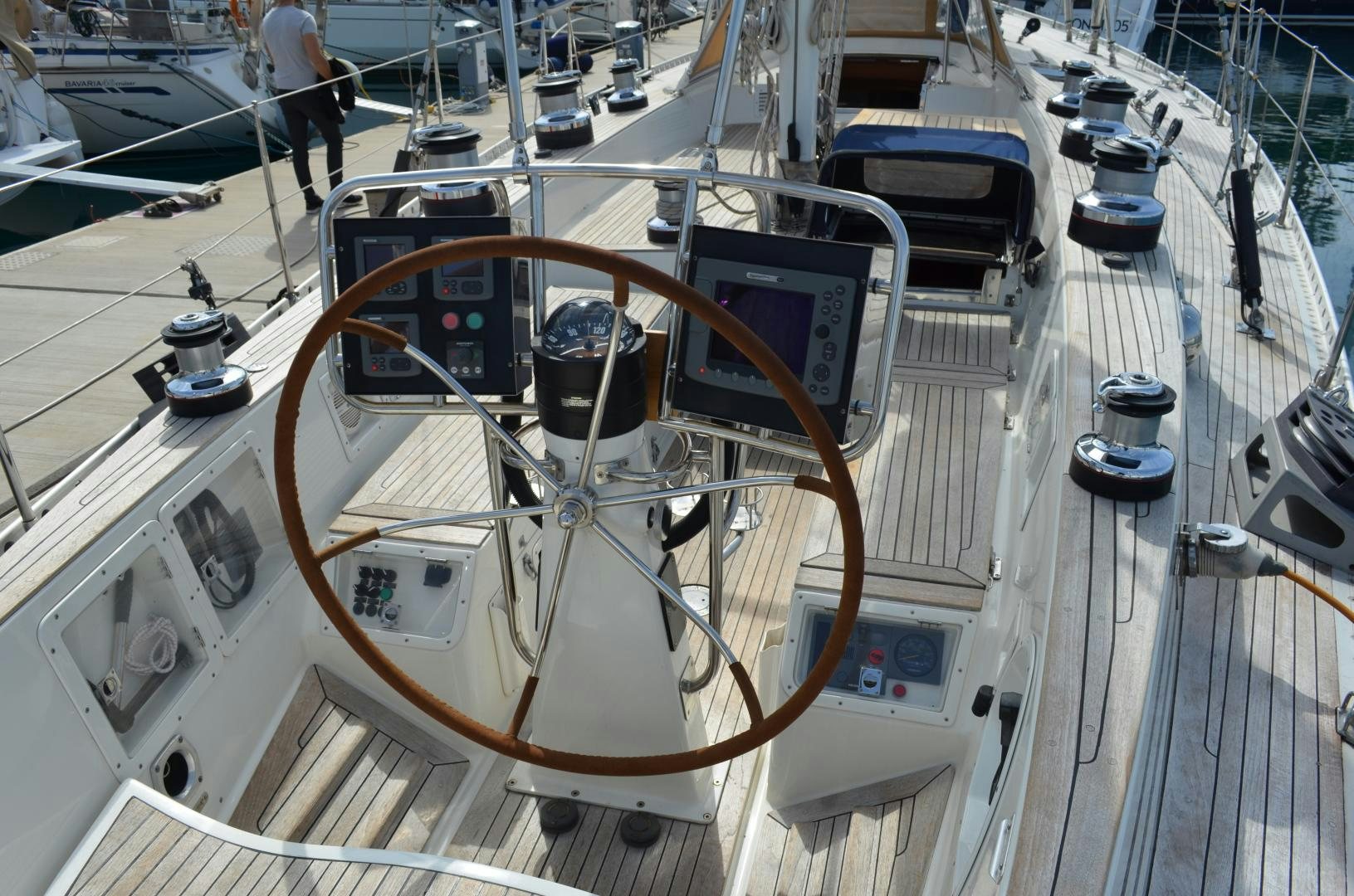 a large white machine with a large white wheel aboard blue magic Yacht for Sale