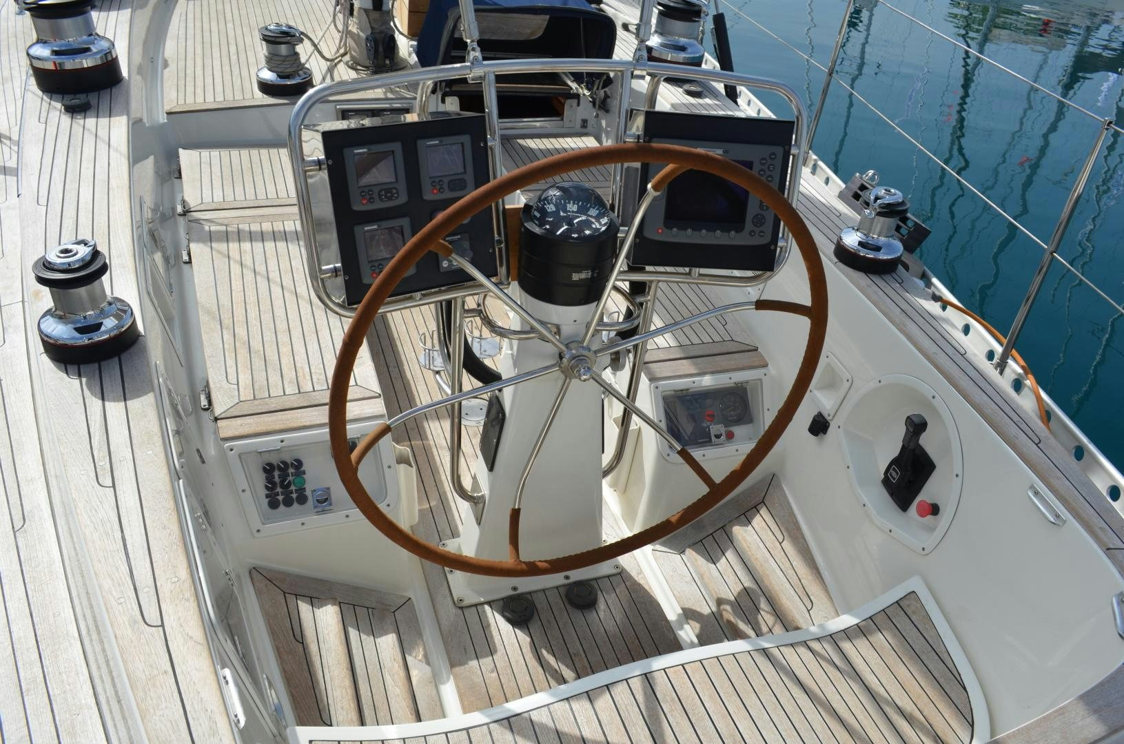a white and black machine aboard blue magic Yacht for Sale