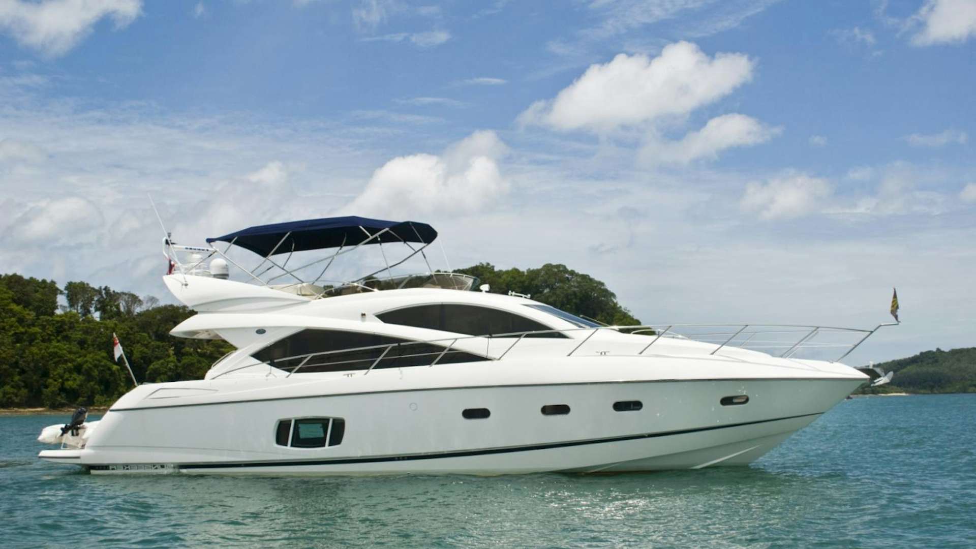 a white yacht in the water aboard MAIKHAO DREAM Yacht for Sale