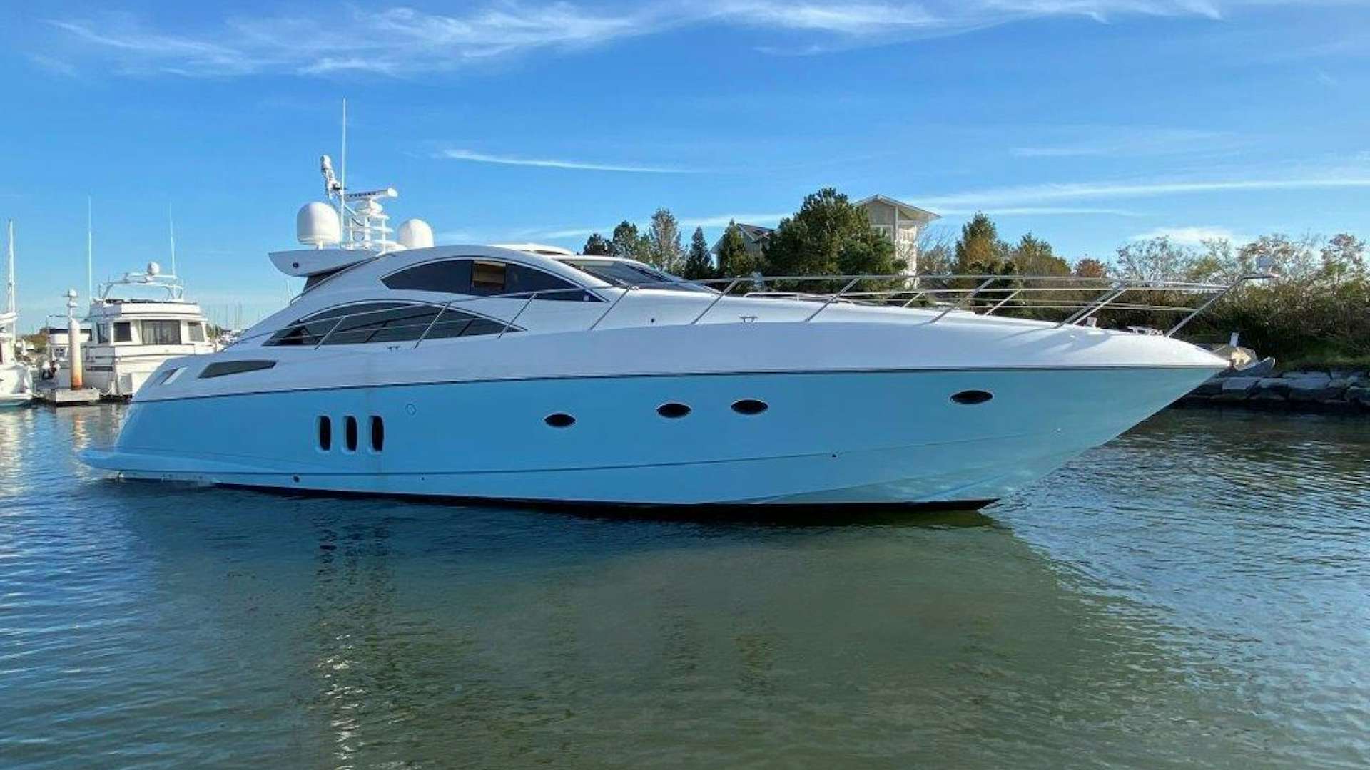 a white yacht in the water aboard No Name Yacht for Sale