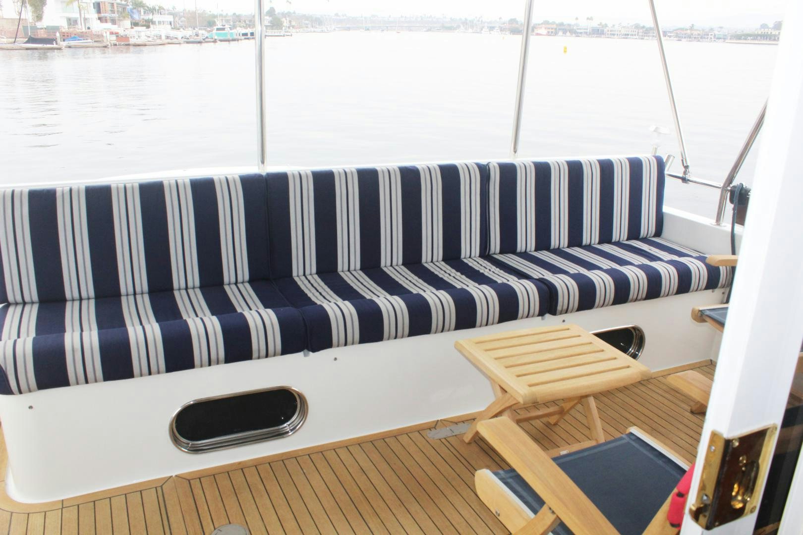 a deck with a laptop on it aboard LADY CYNTHIA Yacht for Sale
