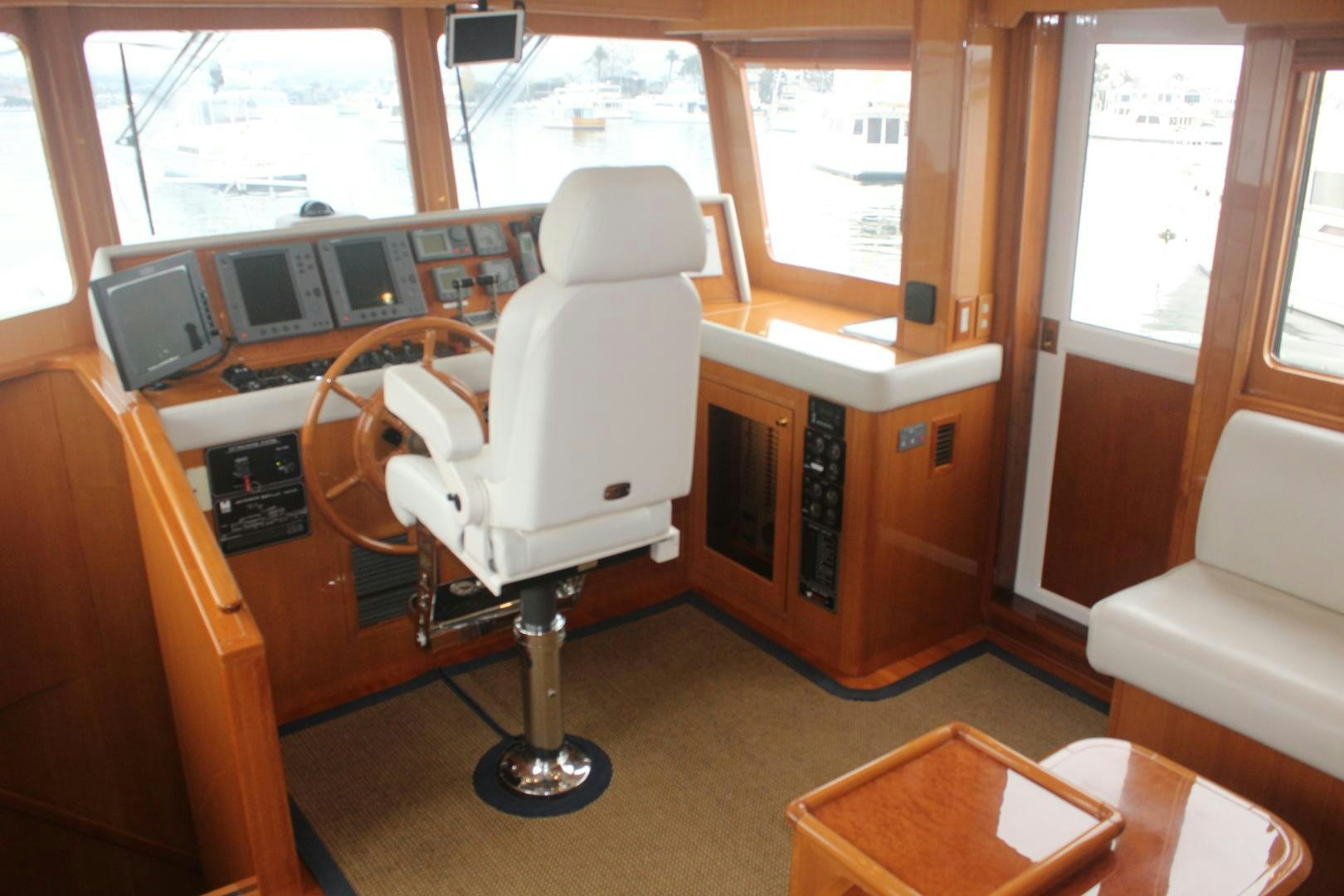 a room with a desk and a chair aboard LADY CYNTHIA Yacht for Sale