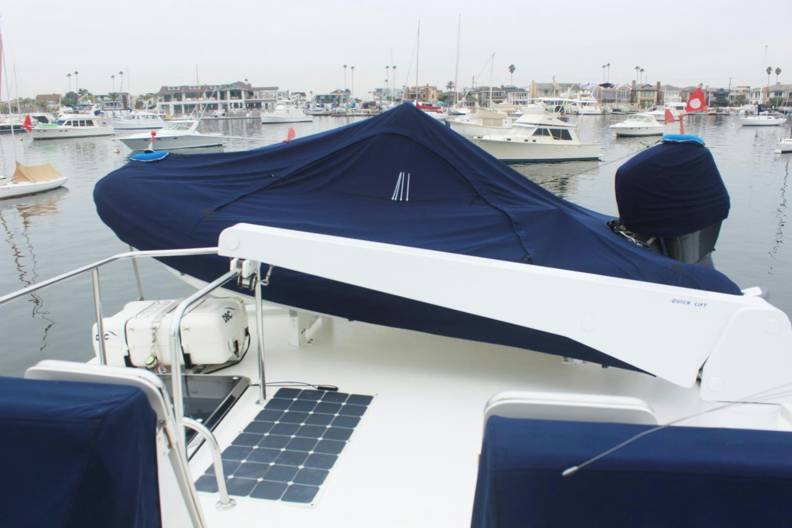 a boat with a cover on it aboard LADY CYNTHIA Yacht for Sale