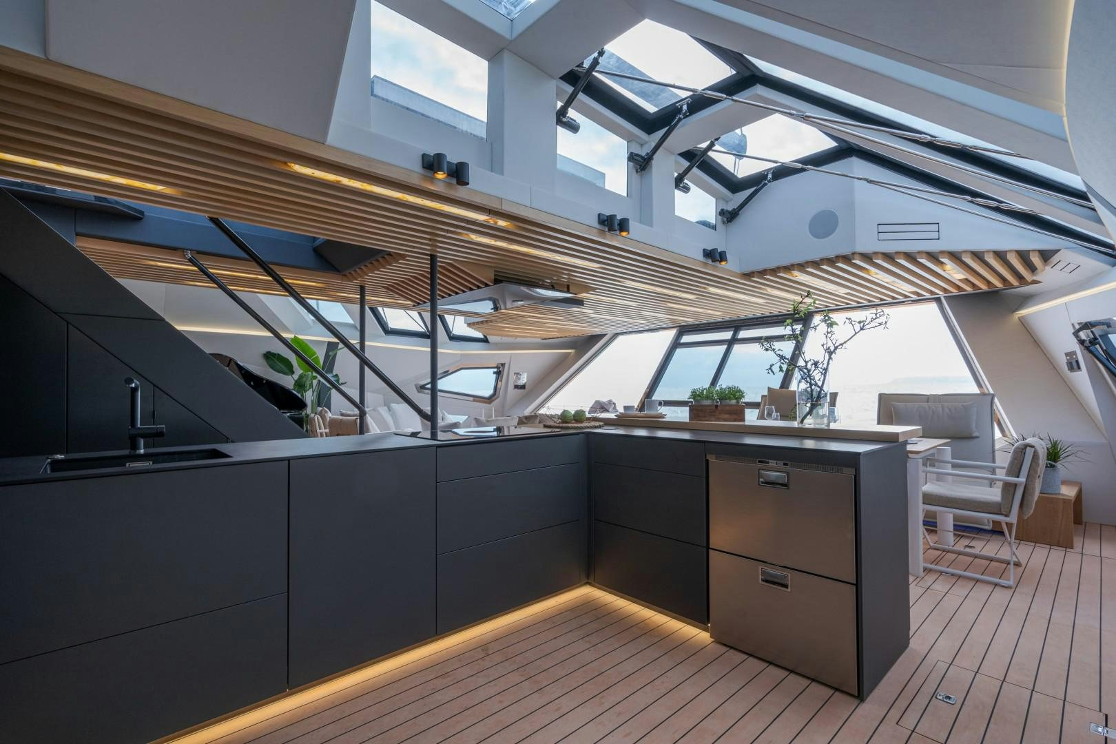 a room with a large open roof aboard X1 Yacht for Sale