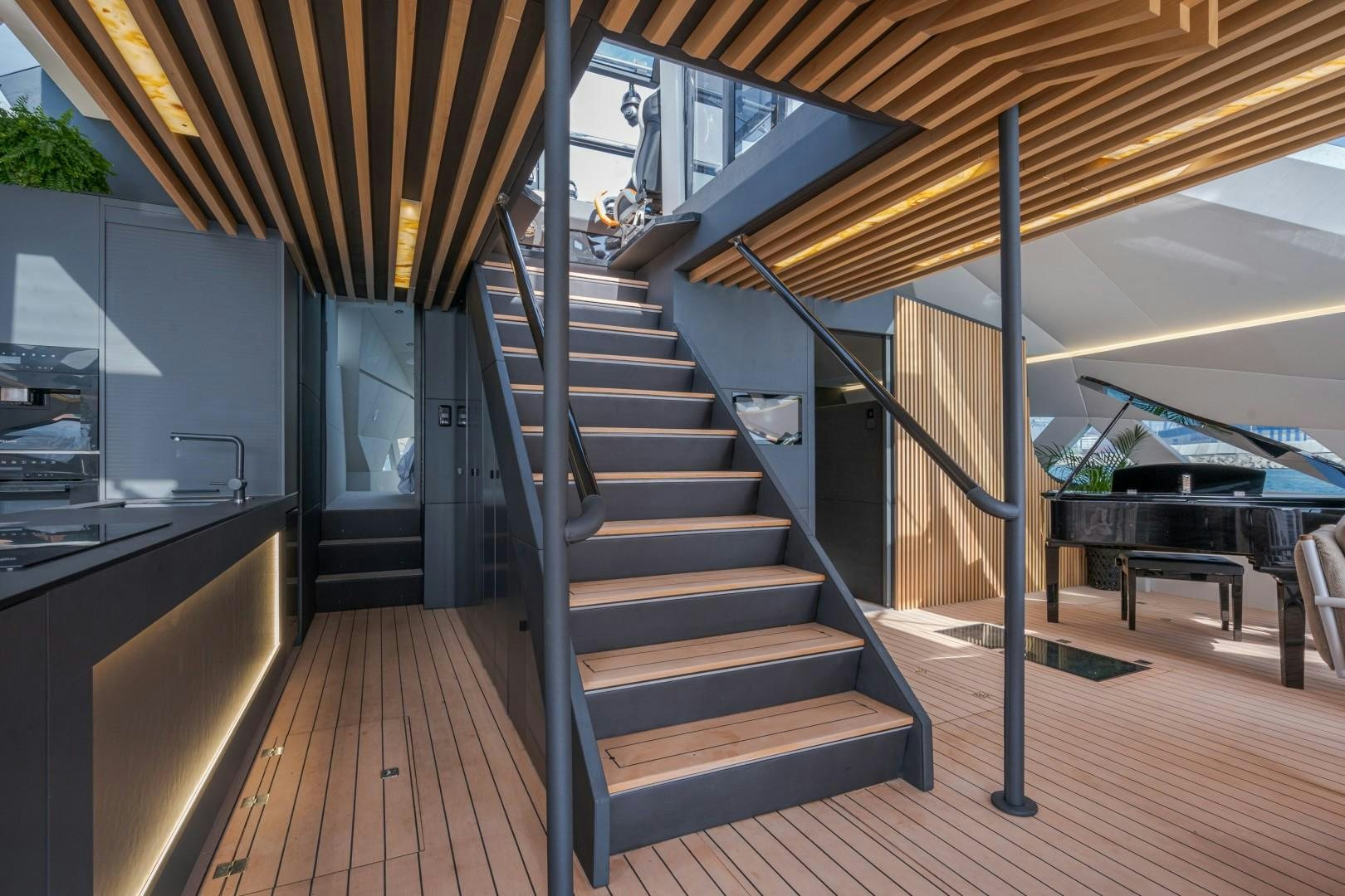 a wooden house with a staircase aboard X1 Yacht for Sale