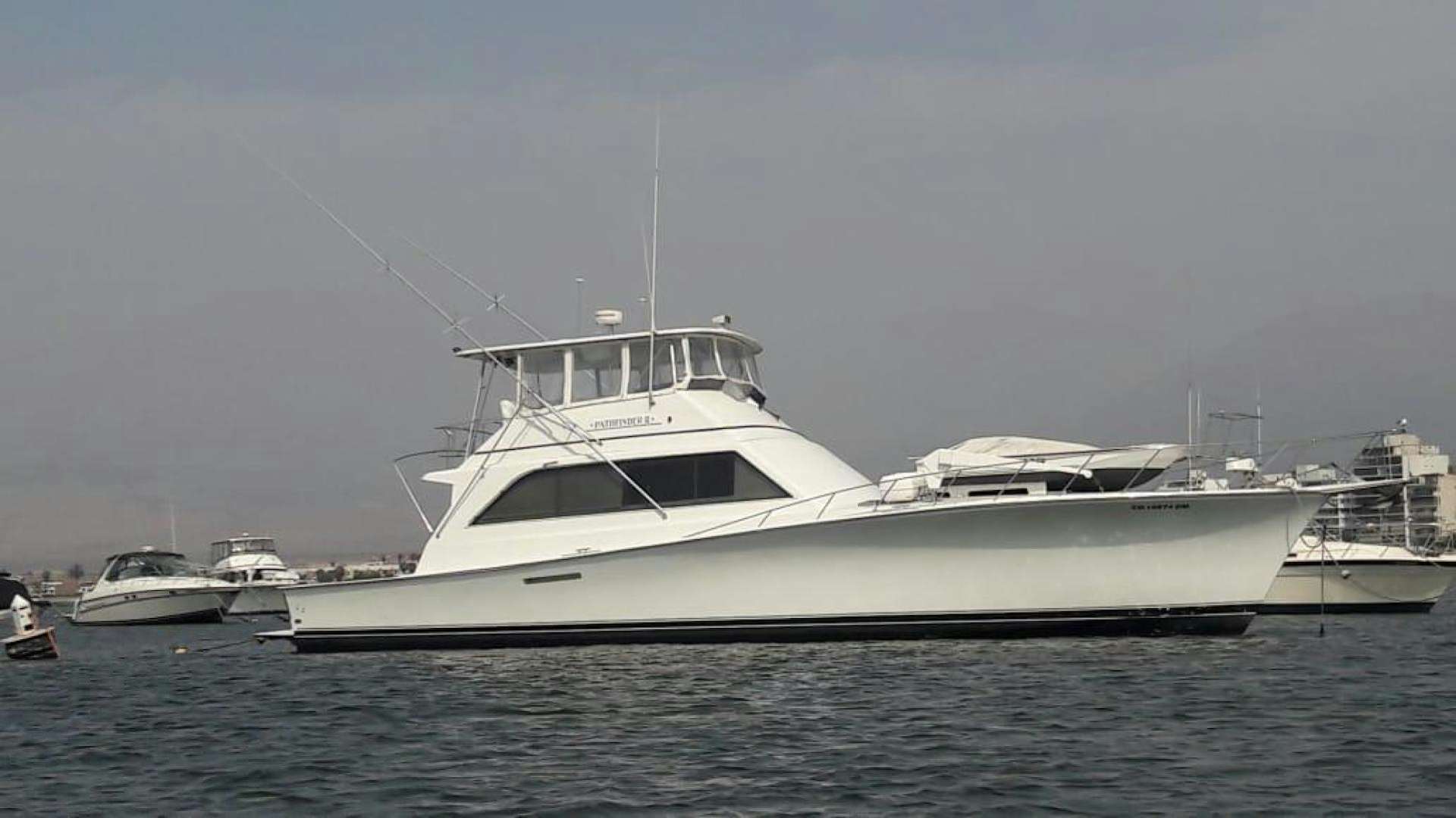a large white boat in the water aboard PATHFINDER 2 Yacht for Sale