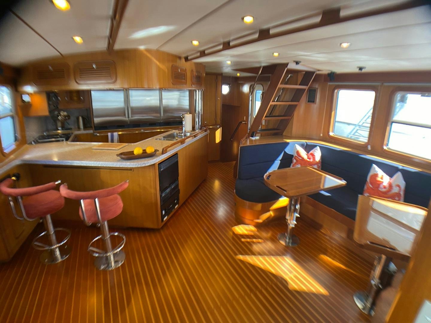a kitchen and living room area aboard RHINO 1 Yacht for Sale
