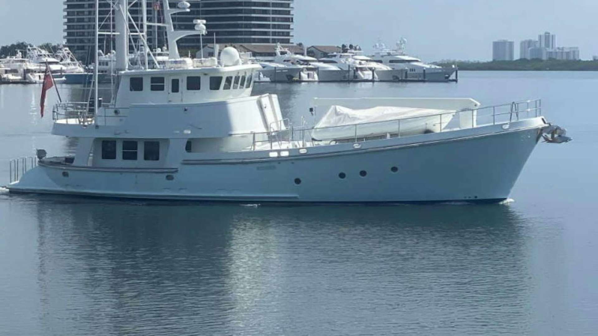 a large white boat in the water aboard RHINO 1 Yacht for Sale
