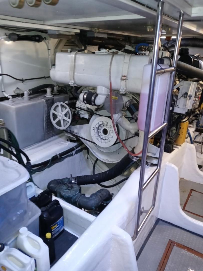 a car with a large engine aboard DESTINATION Yacht for Sale