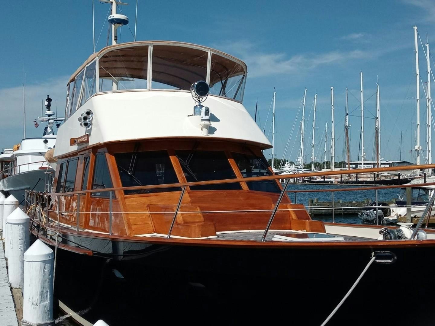 a boat in a harbor aboard DESTINATION Yacht for Sale