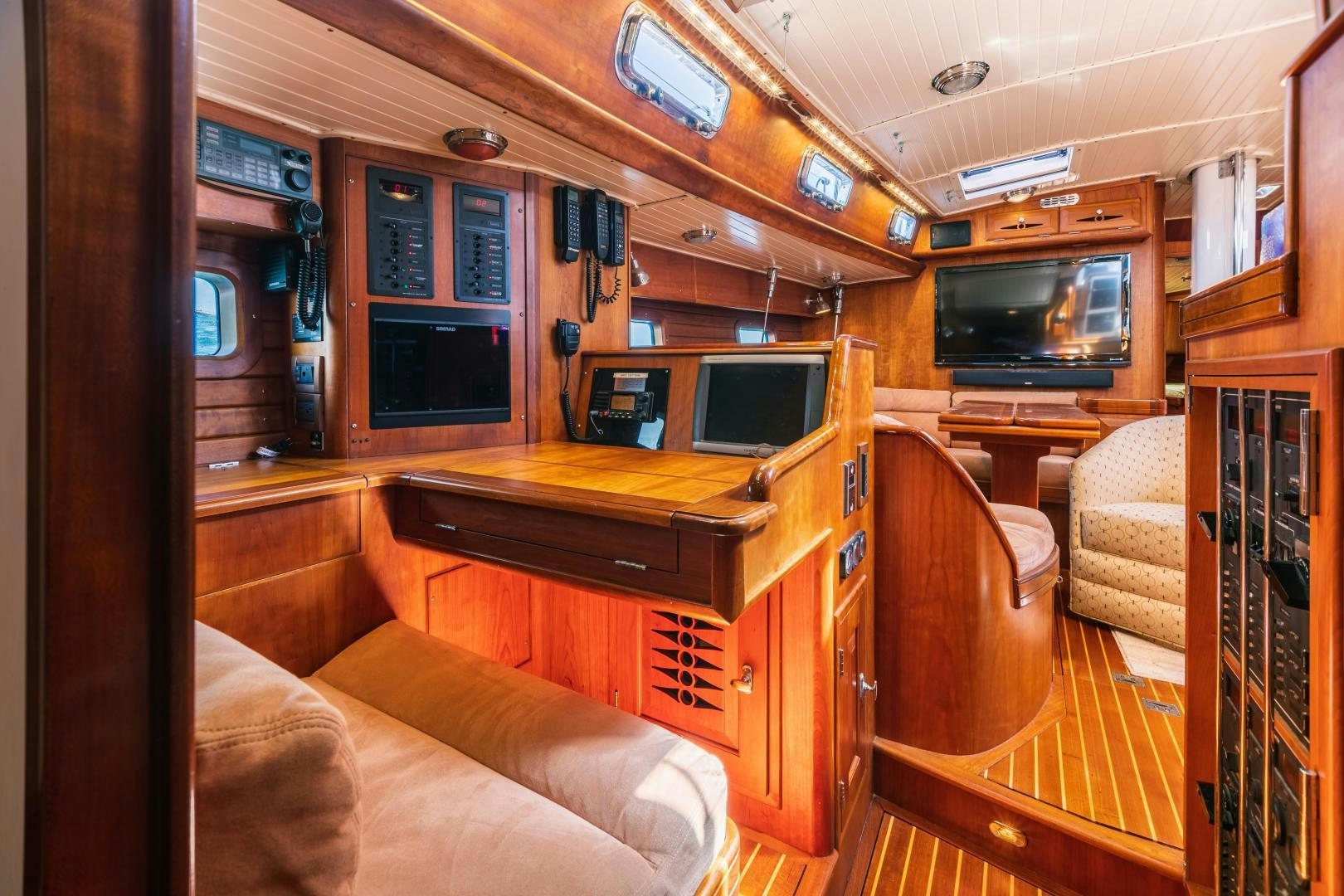 a cabin with a desk and a couch aboard SHOWTIME Yacht for Sale