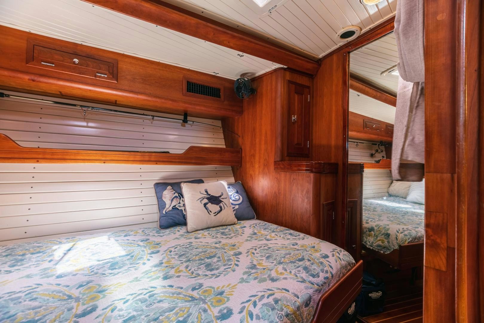 a bed in a cabin aboard SHOWTIME Yacht for Sale
