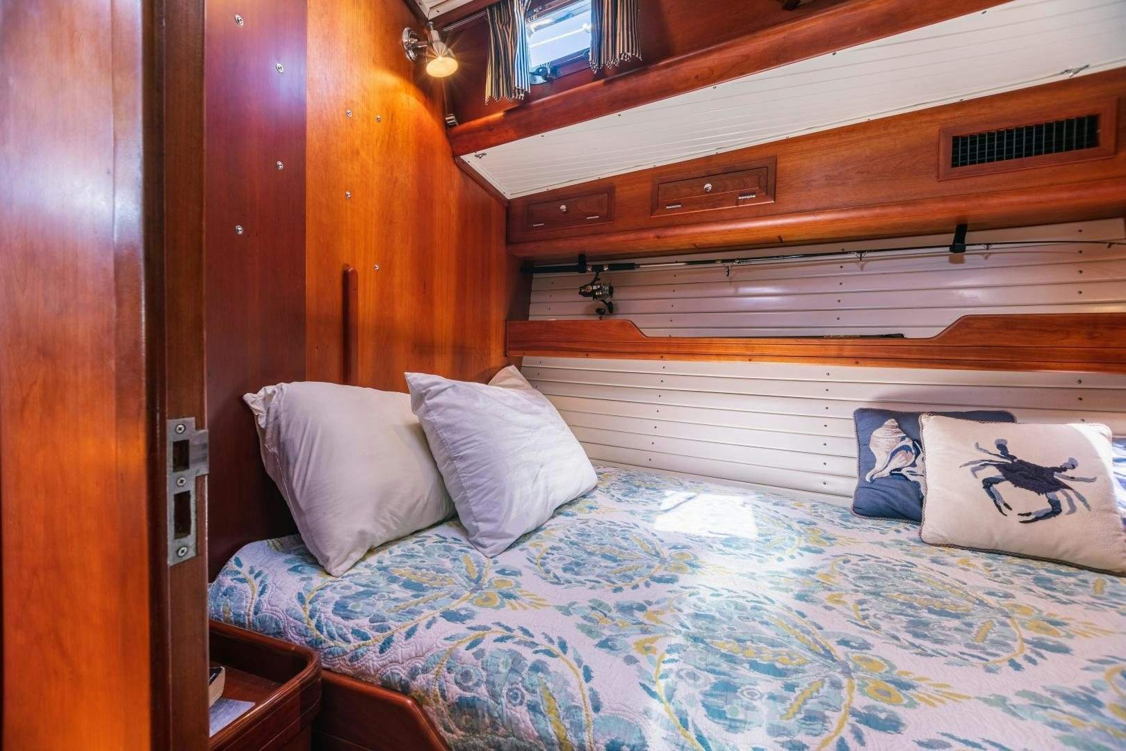 a bed with pillows aboard SHOWTIME Yacht for Sale