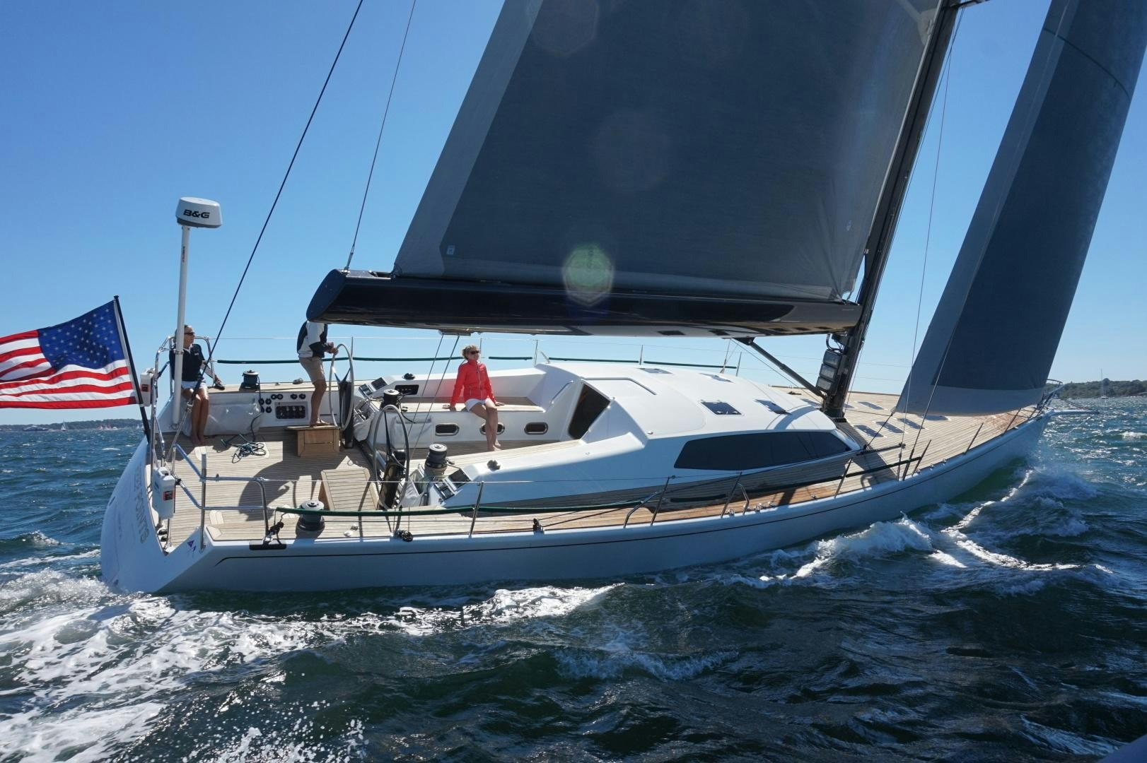 a boat with people on it aboard REEF POINTS Yacht for Sale