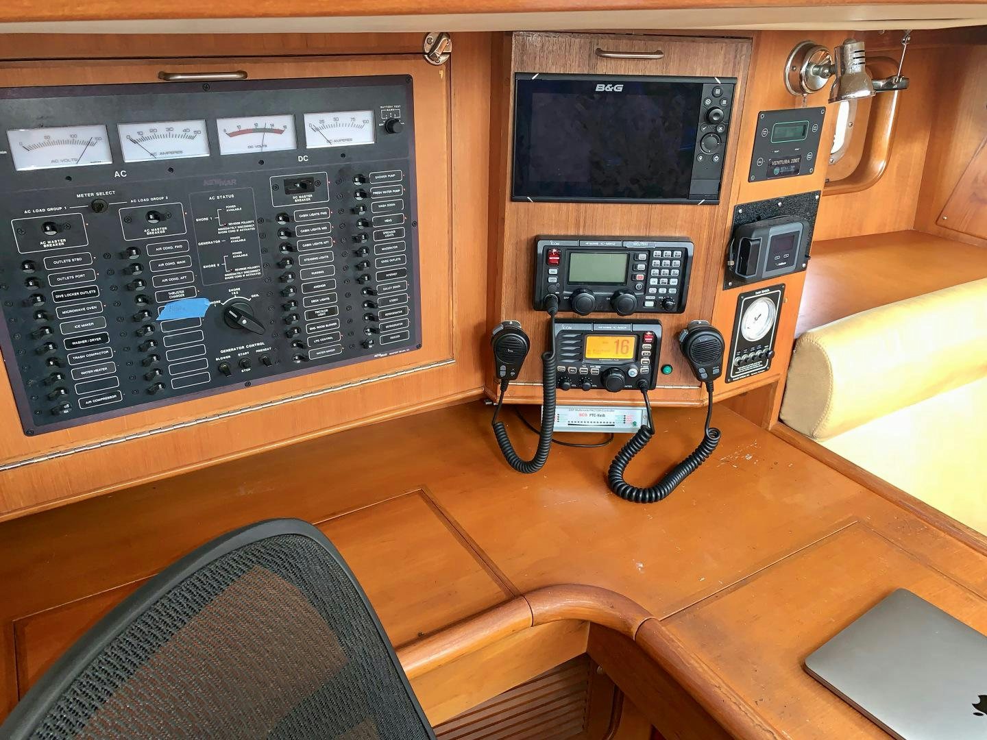 a radio and a television in a room aboard REVERENCE Yacht for Sale