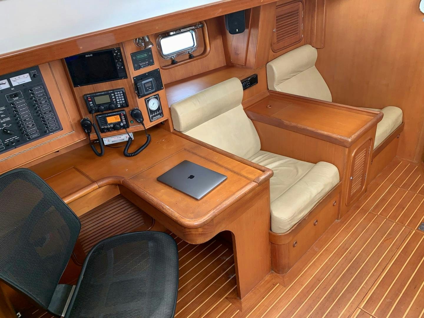 a room with a laptop and a chair aboard REVERENCE Yacht for Sale
