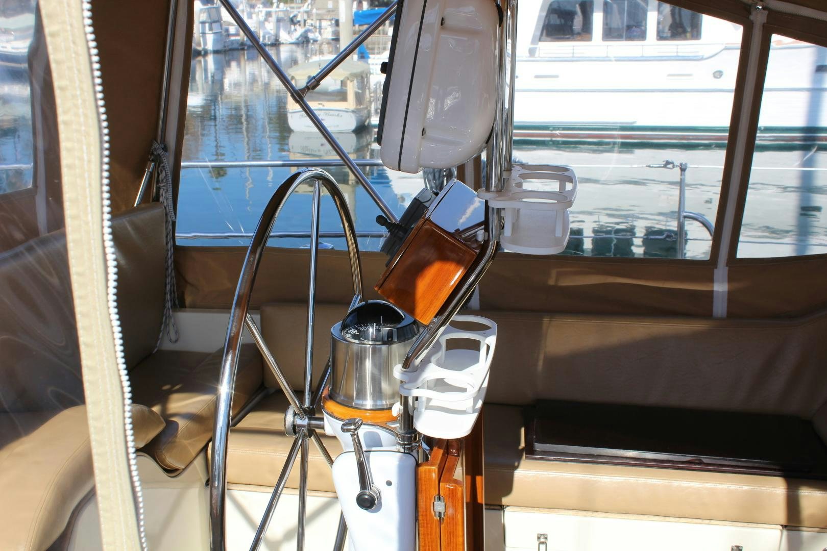 a vehicle with a steering wheel aboard REVERENCE Yacht for Sale