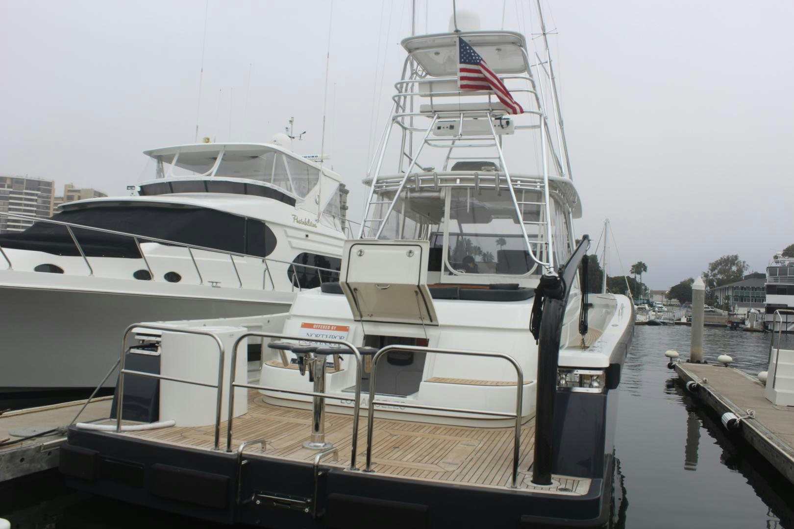 a boat docked at a pier aboard FELINA Yacht for Sale