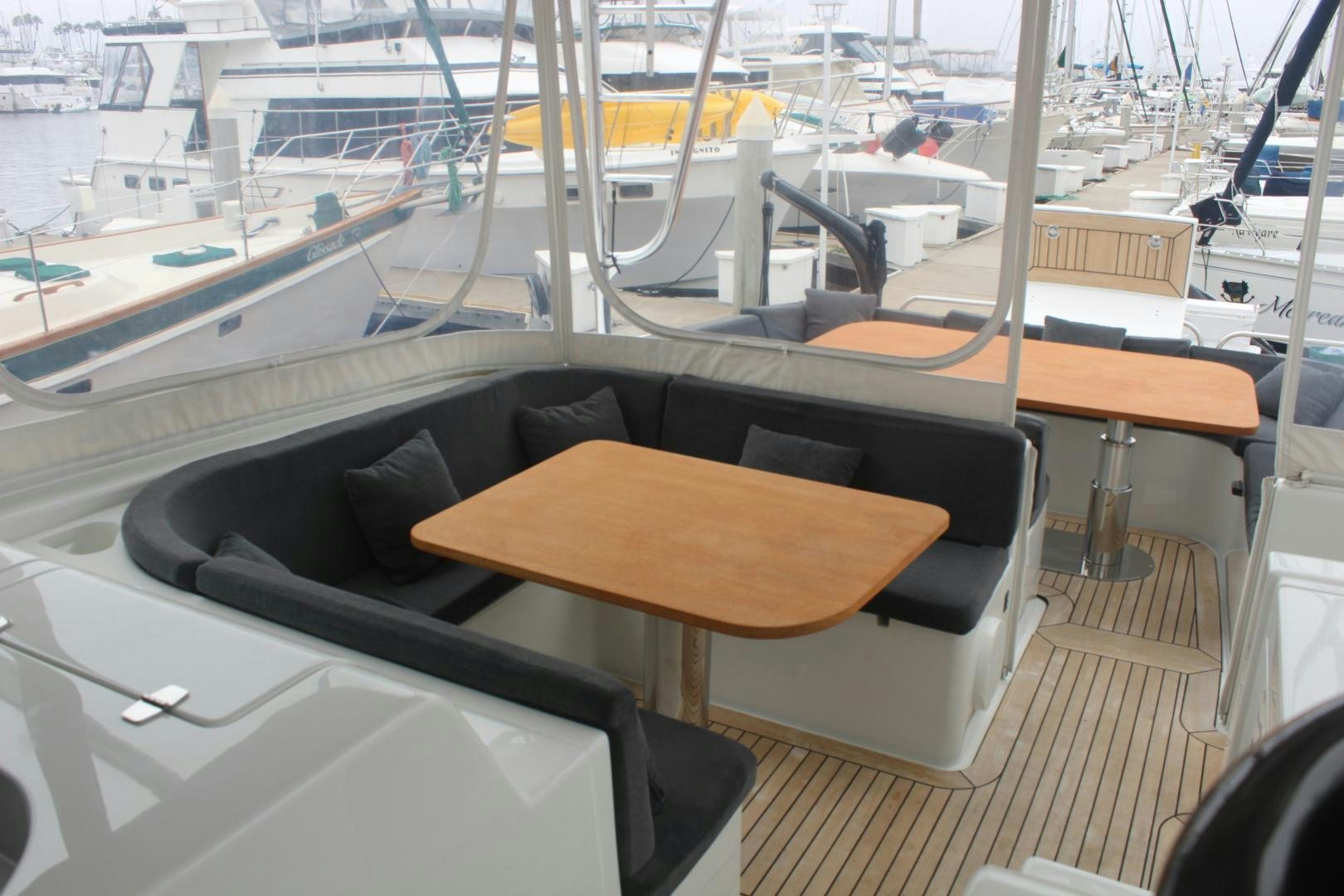 a boat with a table and chairs aboard FELINA Yacht for Sale