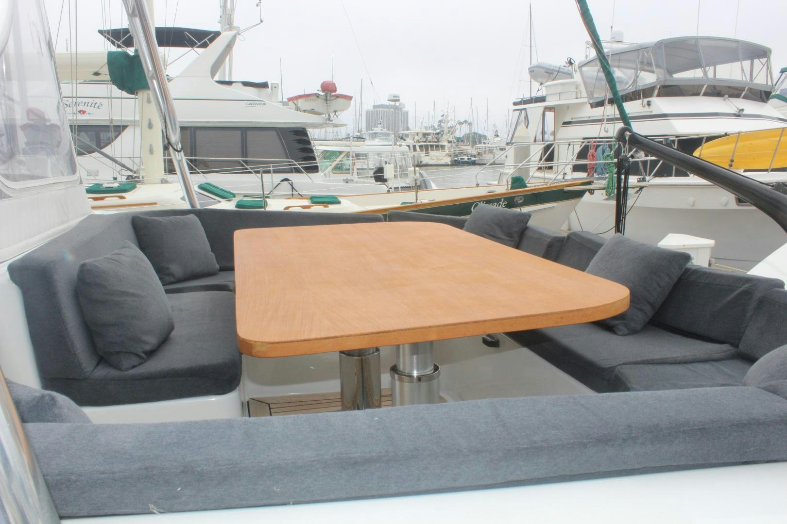 a couch and a table on a boat aboard FELINA Yacht for Sale