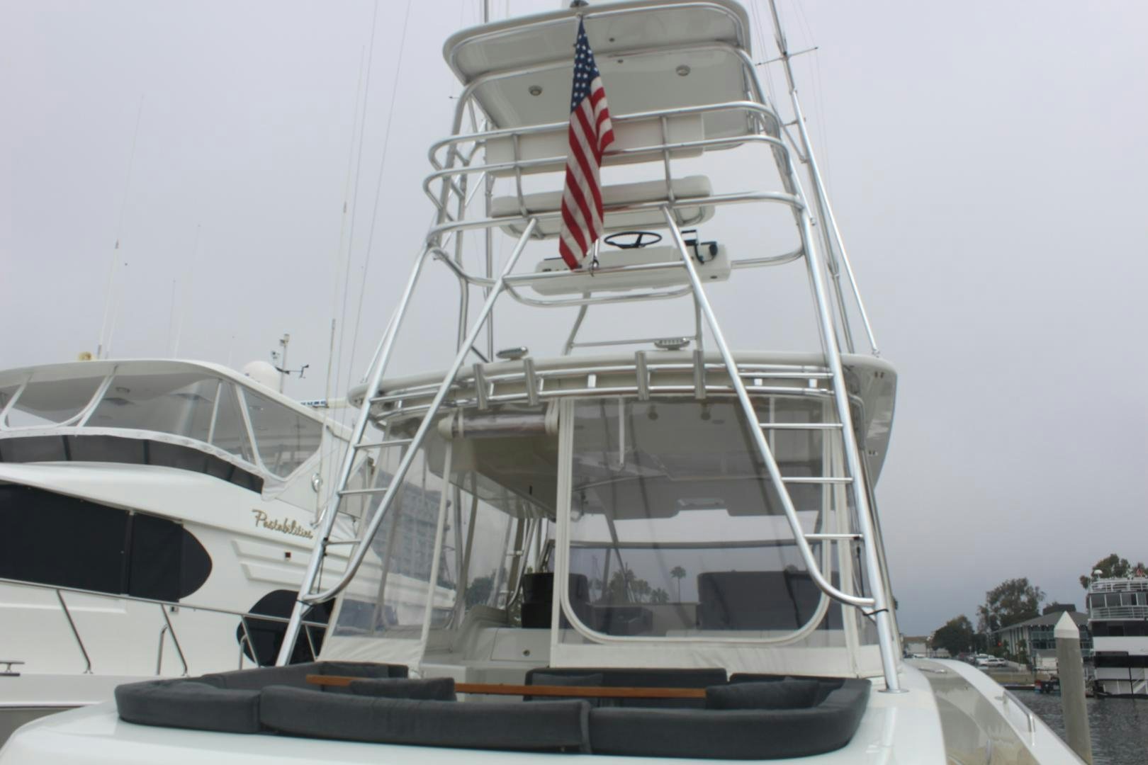 a boat with a flag on the front aboard FELINA Yacht for Sale